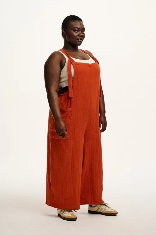 Rudy - Cotton Gauze Dungarees in Terracotta Orange sold by Lucy & Yak
