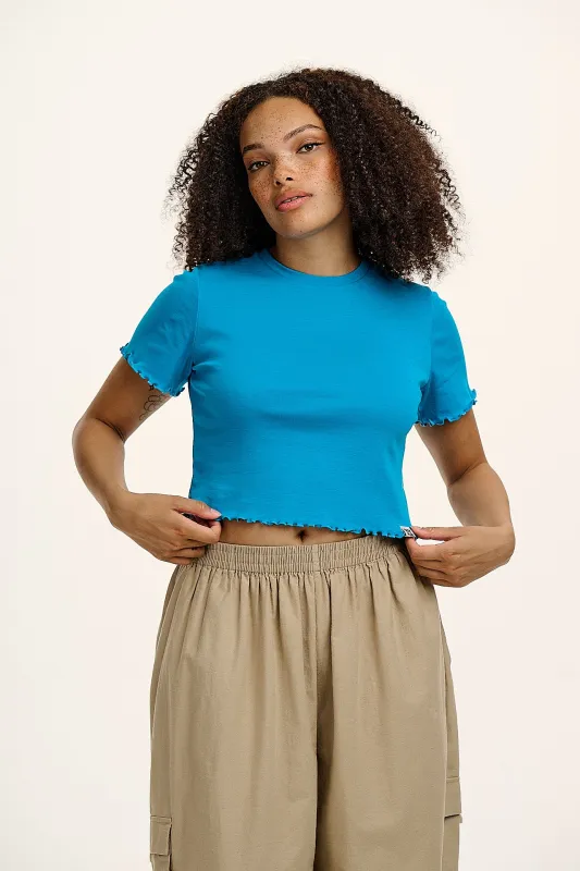 Greta - Cropped Cotton Top in Hawaiian Blue sold by Lucy & Yak