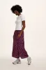 Poppy - Elasticated Waist Skirt in Purple Ditsy Floral Print sold by Lucy & Yak