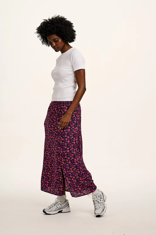 Poppy - Elasticated Waist Skirt in Purple Ditsy Floral Print sold by Lucy & Yak