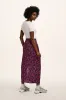Poppy - Elasticated Waist Skirt in Purple Ditsy Floral Print sold by Lucy & Yak