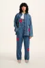 Olly - Denim Jacket in Mid Wash Blue with Pink Flower Motif sold by Lucy & Yak