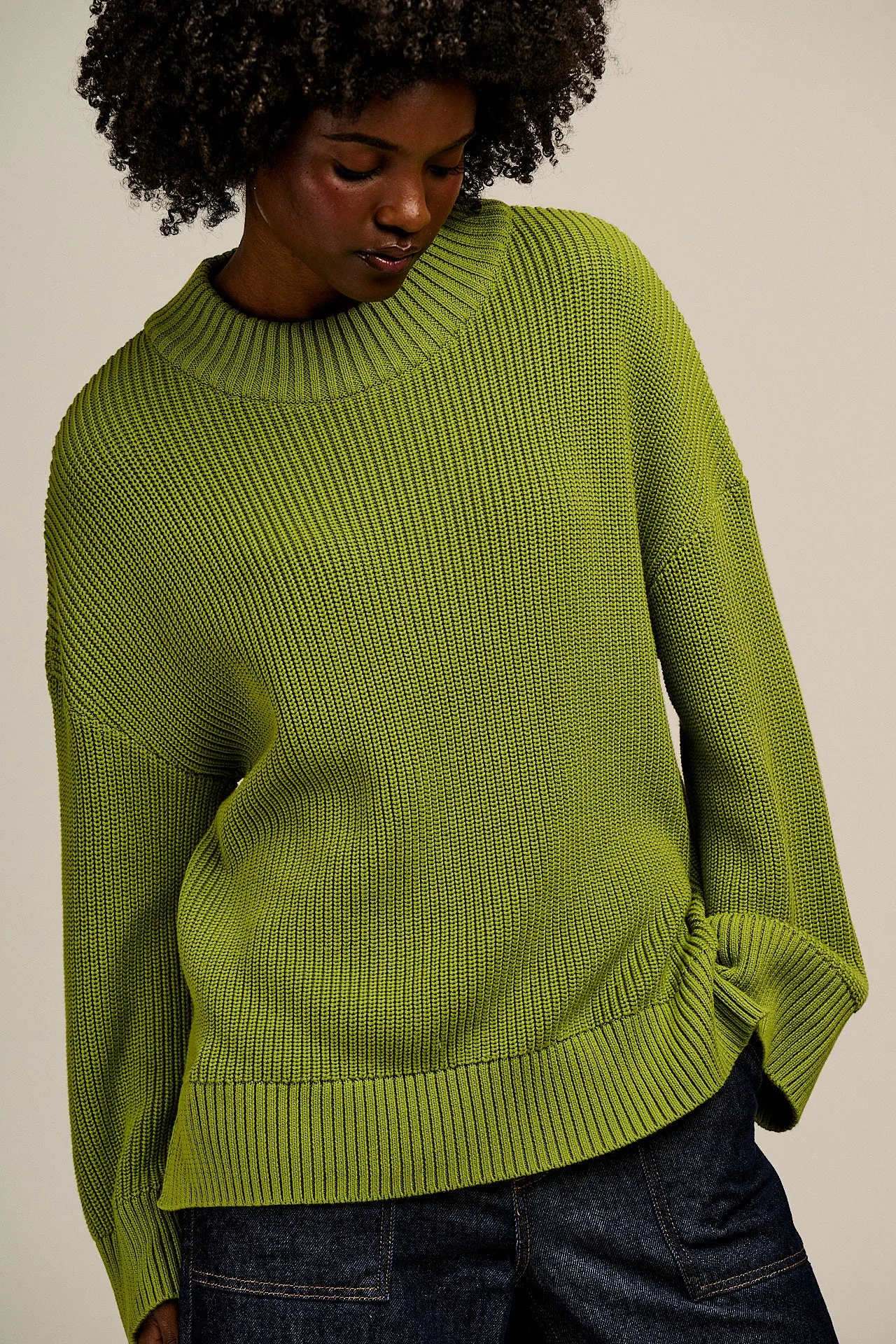 Amari - Oversized Knitted Jumper in Lima Bean Green sold by Lucy & Yak product image thumbnail 2