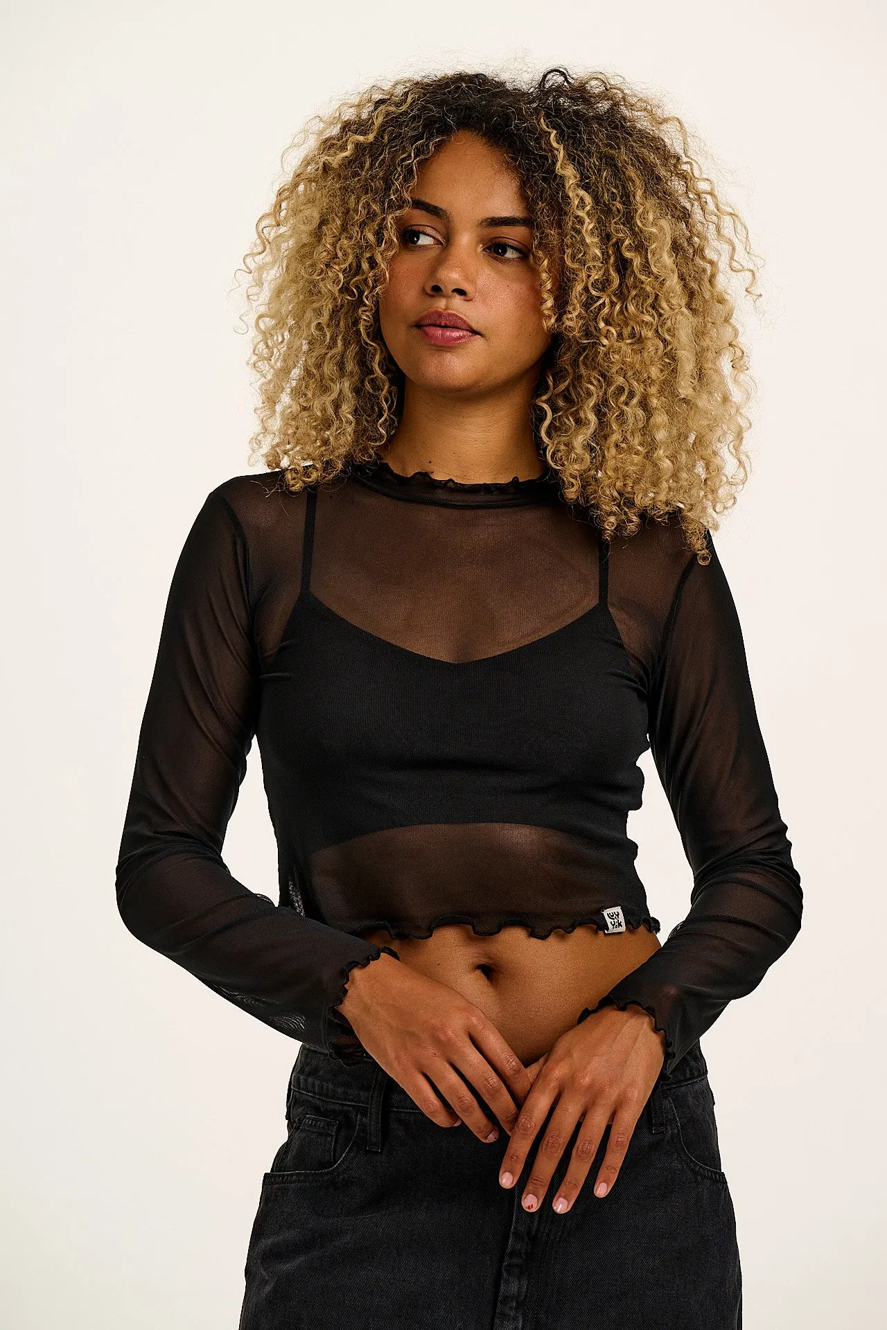 Perrie - Long Sleeve Mesh Top in Black sold by Lucy & Yak