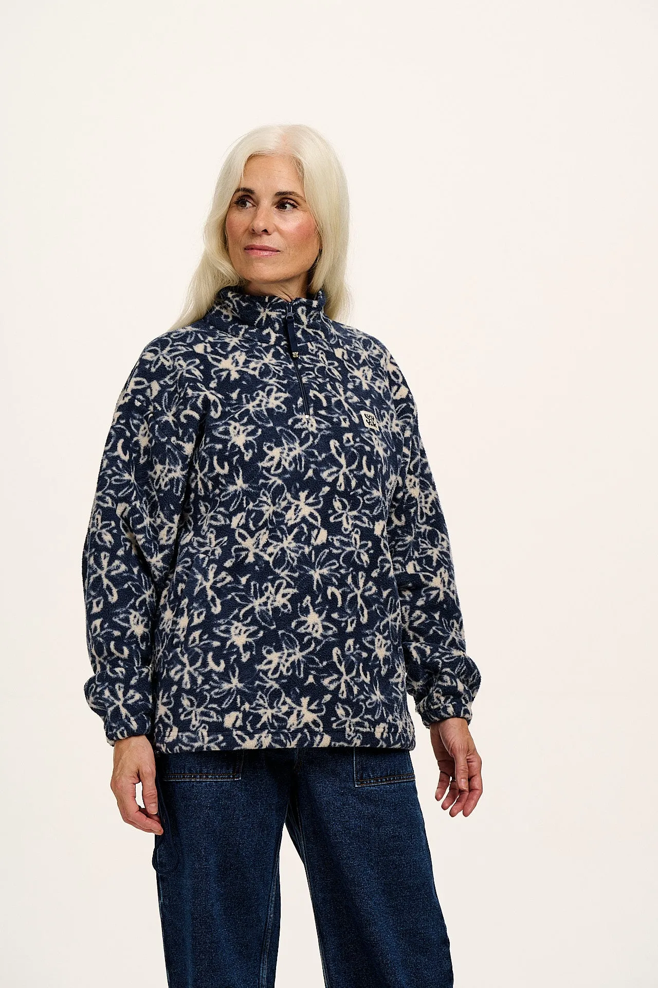 Stevie - Polar Fleece in Inked Blue Floral Print sold by Lucy & Yak