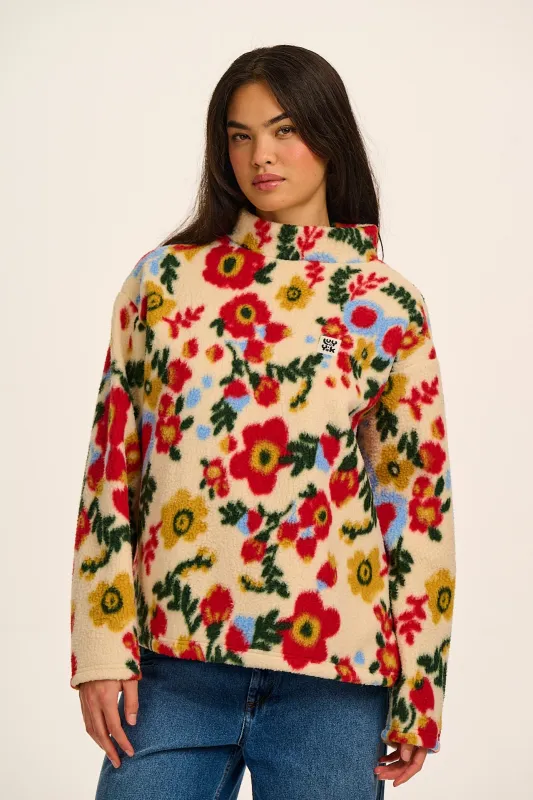 Manaia - Funnel Neck Polar Fleece in Follow Trails Floral sold by Lucy & Yak