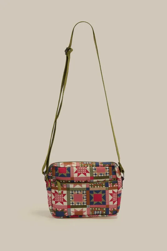 Dara - Cotton Crossbody Bag in Follow Trails Patchwork Print sold by Lucy & Yak