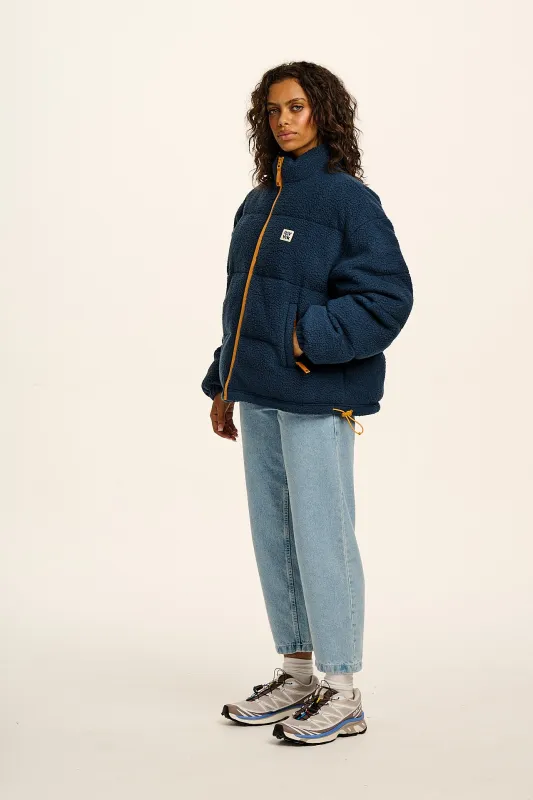 Paloma - Borg Puffer Jacket in Blue sold by Lucy & Yak