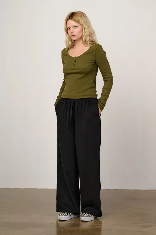 Norris - Wide Leg Cotton Trousers in Black sold by Lucy & Yak