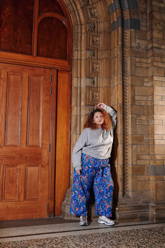 L.E. Chuck - Wide Leg Cotton Trousers in Digital Blur Natural History Museum & Yak sold by Lucy & Yak