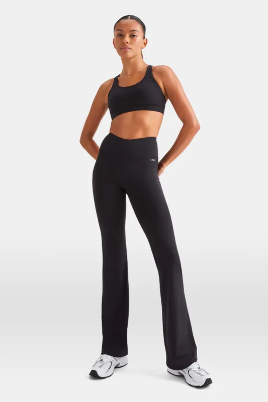 SkinLuxe V-Waist Flared Legging - Shadow Black sold by TALA