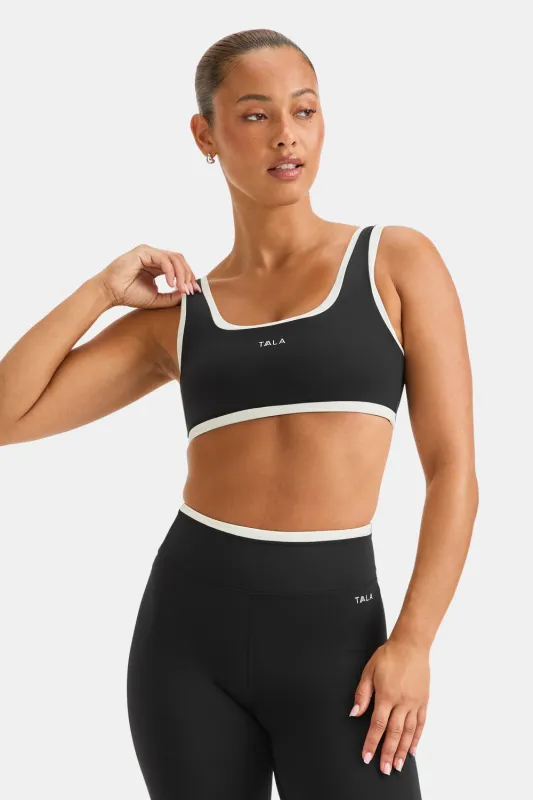 SkinLuxe Contrast Edge Sports Bra - Black / Ivory sold by TALA