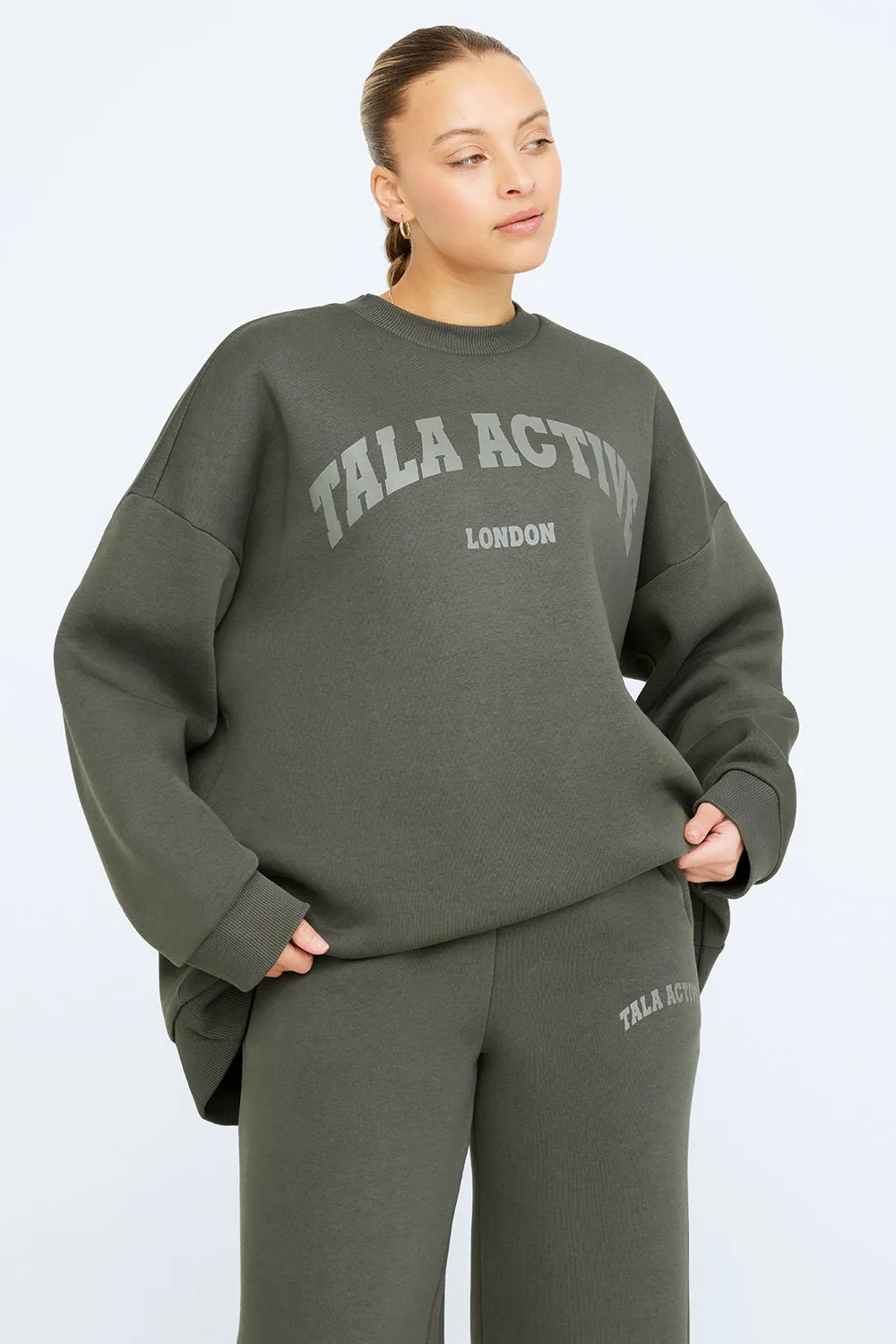 TALA ACTIVE LOOSE HEM OVERSIZED SWEATSHIRT- DARK OLIVE sold by TALA