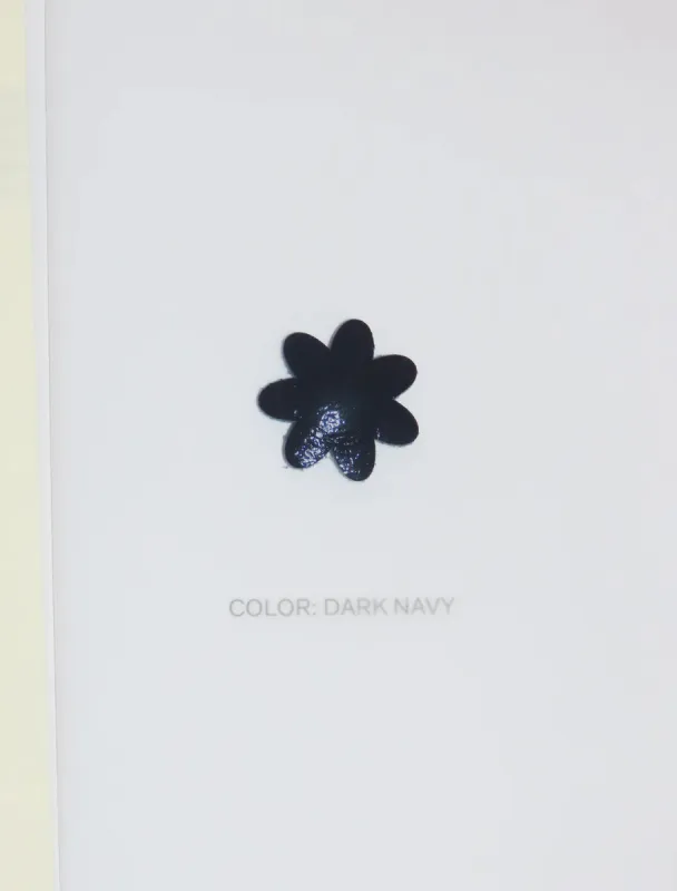 Leather flower snap - dark navy sold by Paloma Wool