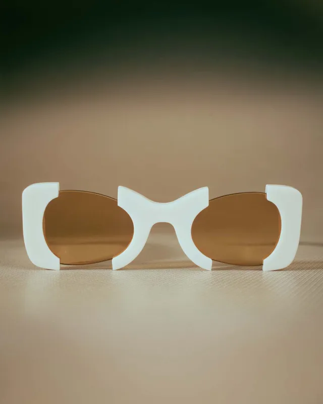 Suki Sculptural Statement Sunglasses - White sold by Kai Collective