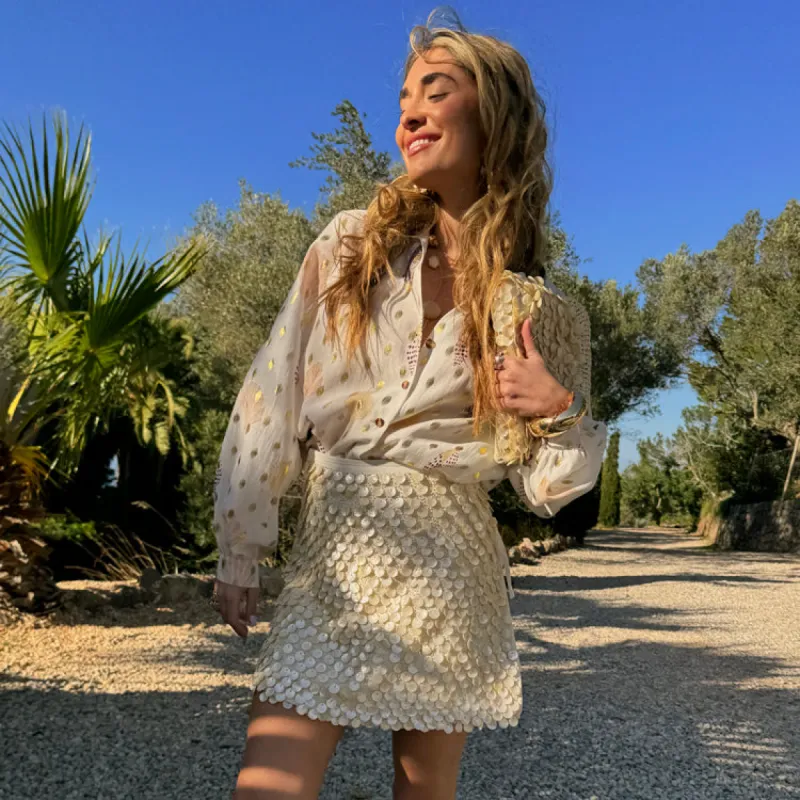 Shell Mini Wrap Skirt sold by Never Fully Dressed