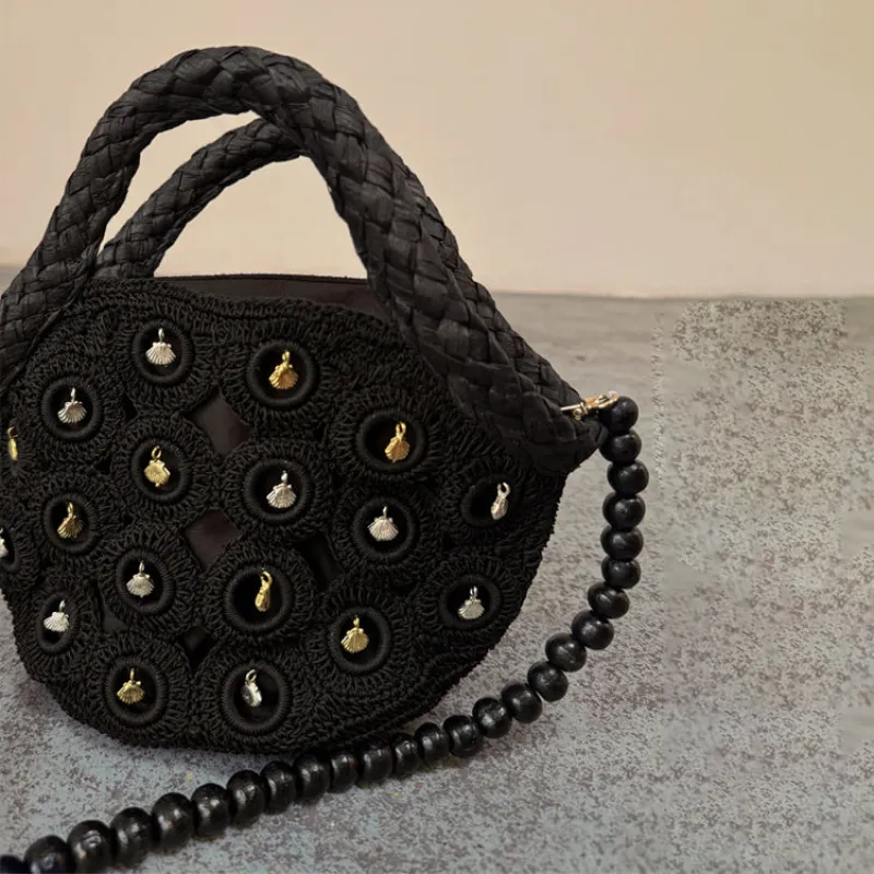 Black Crochet Shell Charm Mini Bag sold by Never Fully Dressed