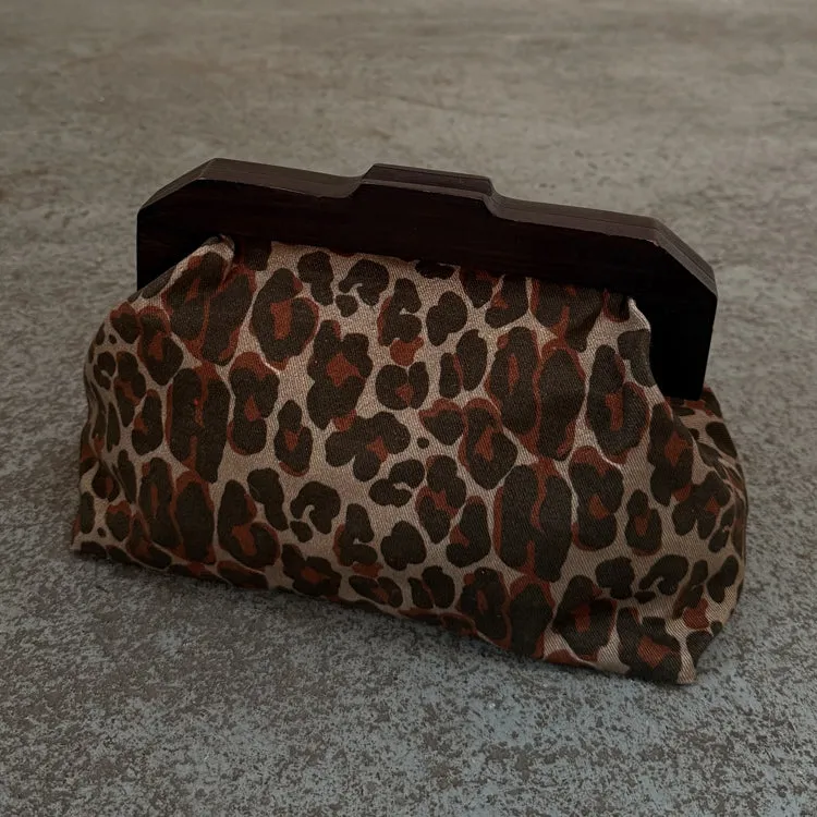 Lucia Leopard Denim Bag sold by Never Fully Dressed