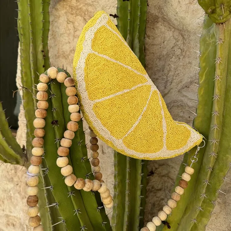 Lemon Beaded Bag sold by Never Fully Dressed