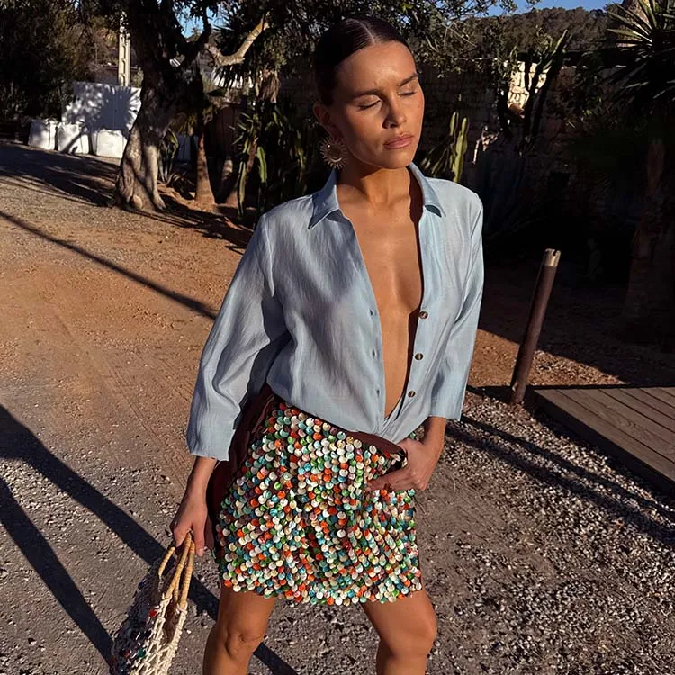 Multi Shell Mini Wrap Skirt sold by Never Fully Dressed