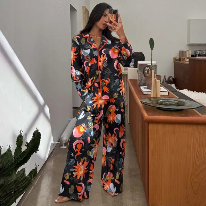 Navy Charm Button Through Pyjamas sold by Never Fully Dressed