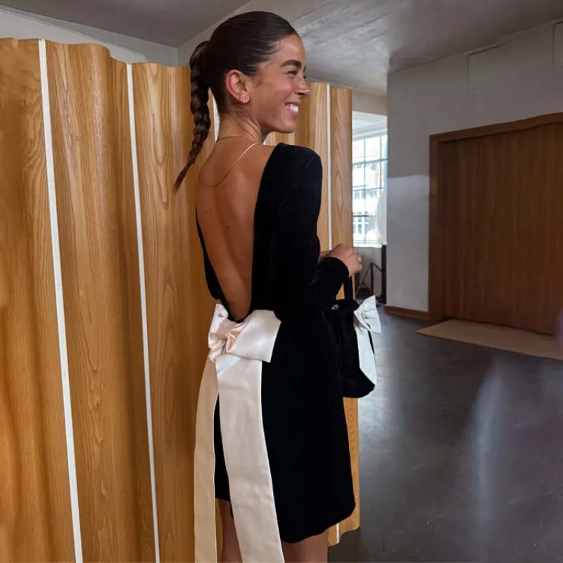 Black Velvet Bow Mini Dress sold by Never Fully Dressed