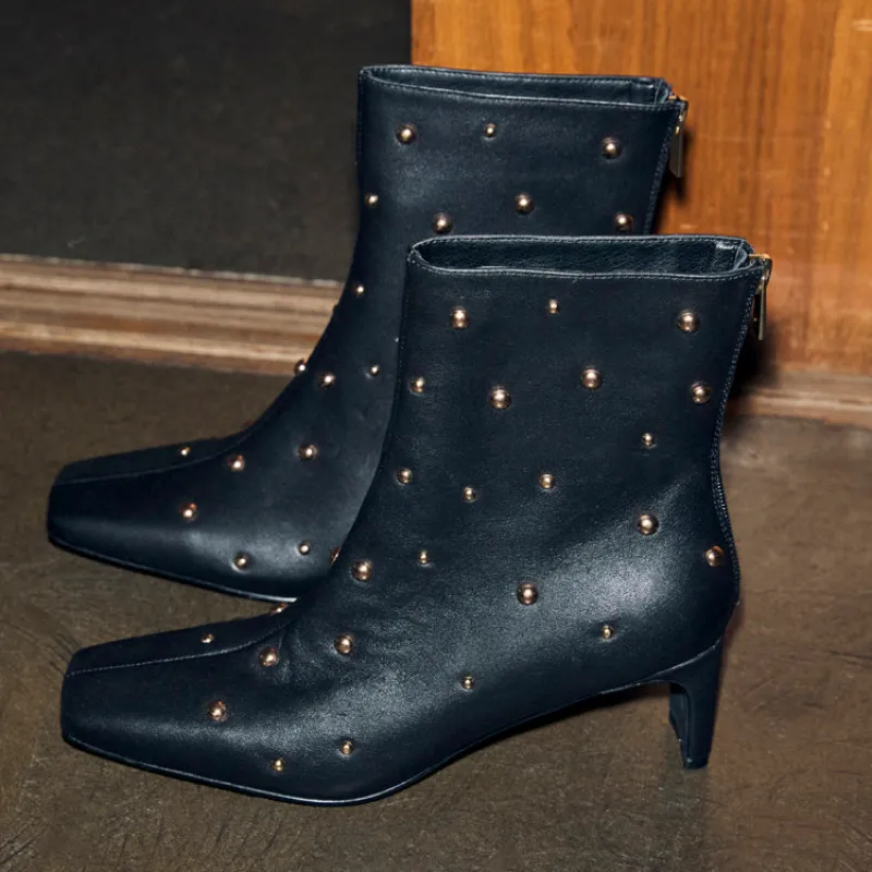 Black Leather Boot with Gold Studs sold by Never Fully Dressed