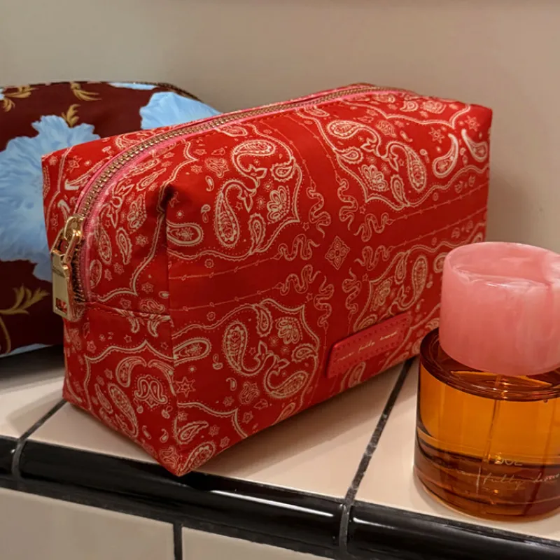 Red Bandana Reversible Make Up Bag sold by Never Fully Dressed