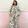 Green Palm Linen Rhea Trousers sold by Never Fully Dressed