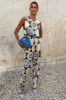 Black Mosaic Plate Jumpsuit sold by Never Fully Dressed