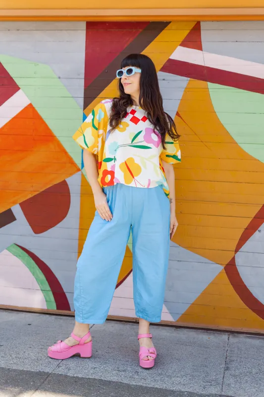 Tee in Picnic Prance sold by Nettle Studios