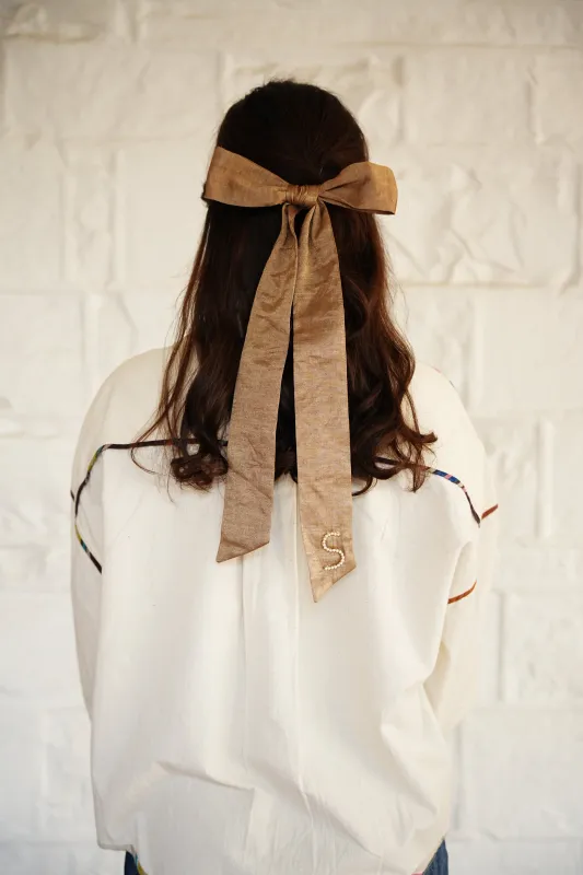 GILDED BOW | NICKEL sold by Rujuta Sheth