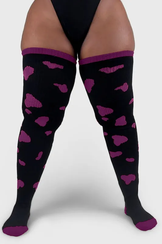 Thunda Tūbbies - Cow Print (Black w/Purple Spots) sold by Thunda Thighs