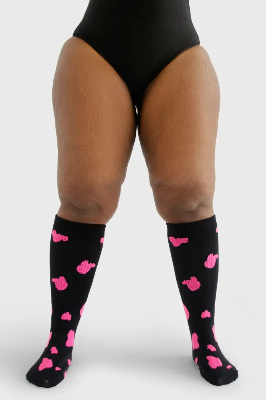 Under the Knee - Cow Print (Black w/Neon Pink Spots) sold by Thunda Thighs