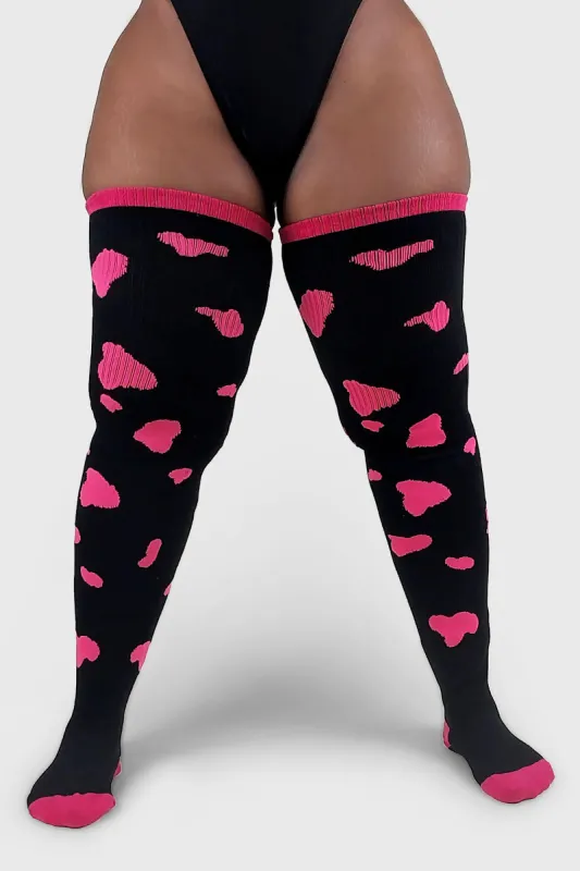 Thunda Tūbbies - Cow Print (Black w/Neon Pink Spots) sold by Thunda Thighs