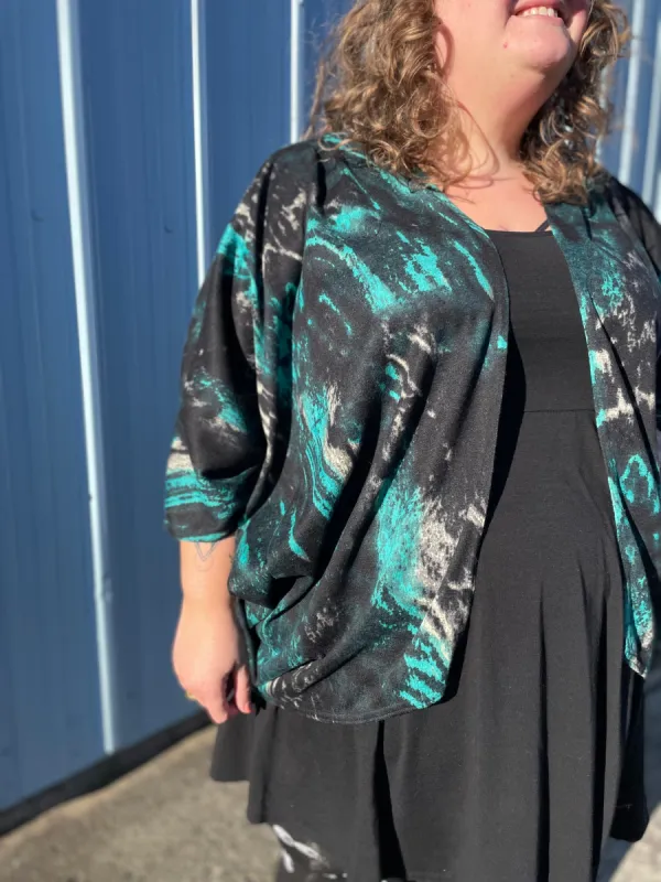 Colorful Swirl Sara Shrug sold by Copper Union Apparel