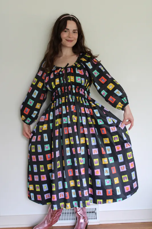 Ruthie Dress in Postage Puppies sold by Isabella Eve