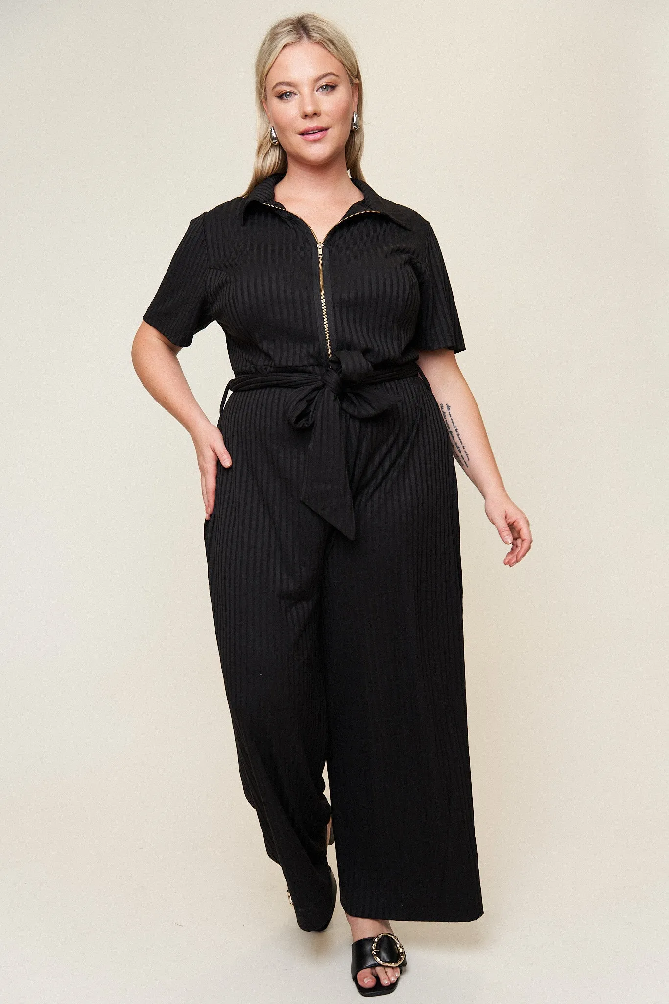 Lucia Belted Jumpsuit sold by What Lo Wants