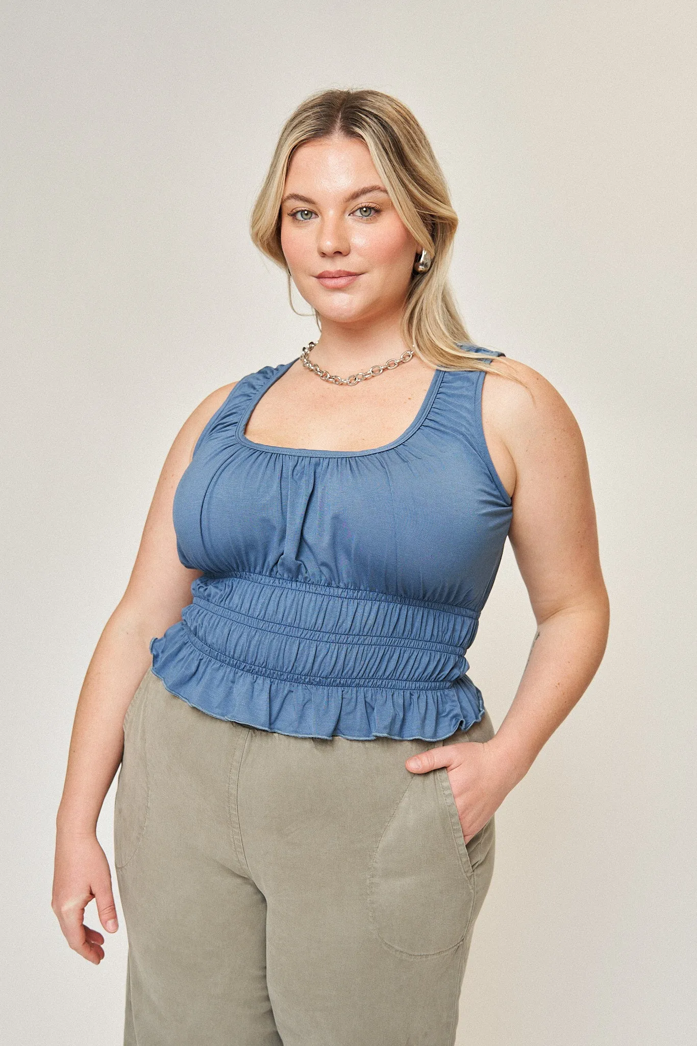 Molly Smocked Corset Tank in Denim Blue sold by What Lo Wants