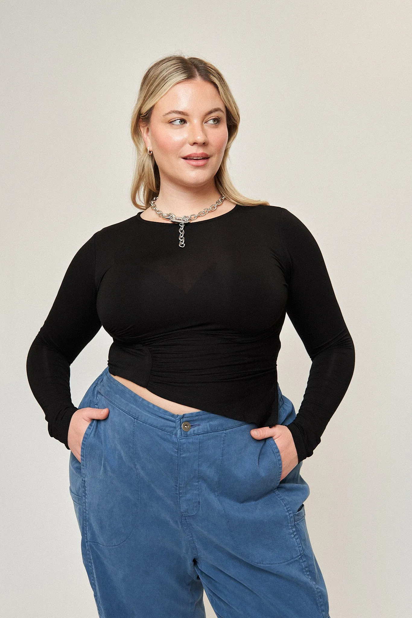 Chloe Asymmetrical Split Top in Black sold by What Lo Wants