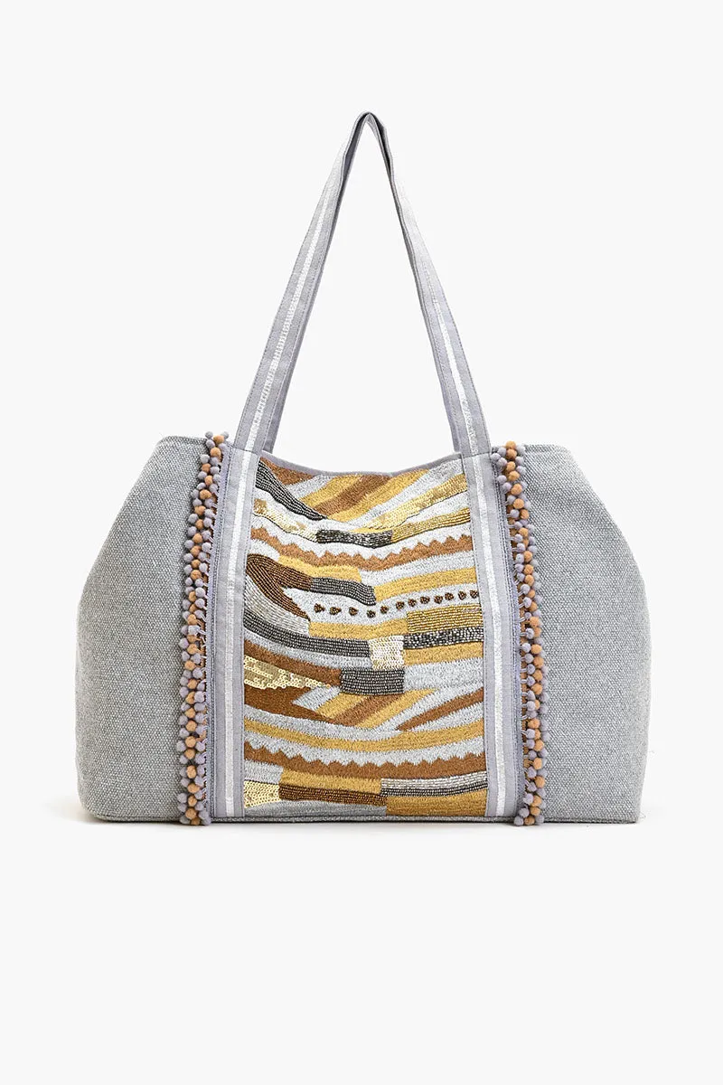 Luxe silver Embellished multi-purpose tote sold by America & Beyond