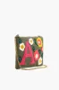 A Floral Crossbody Bag sold by America & Beyond