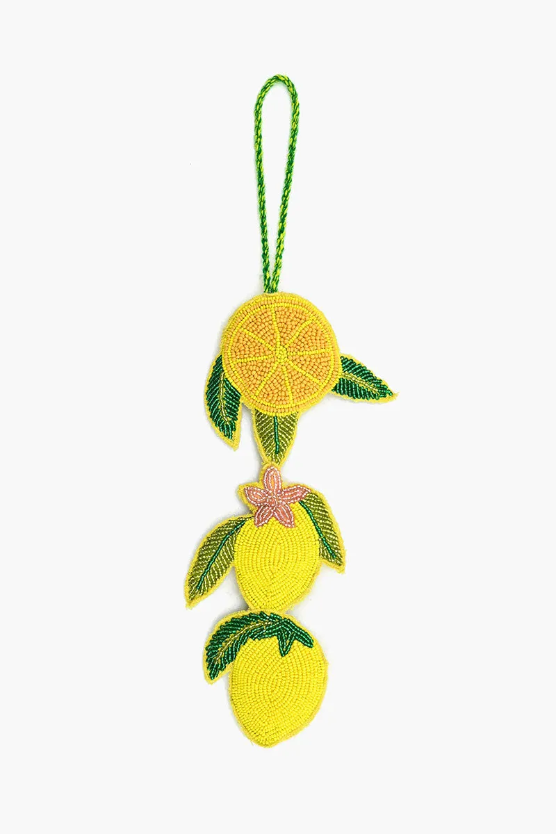 Make Lemonade Beaded Tassel sold by America & Beyond