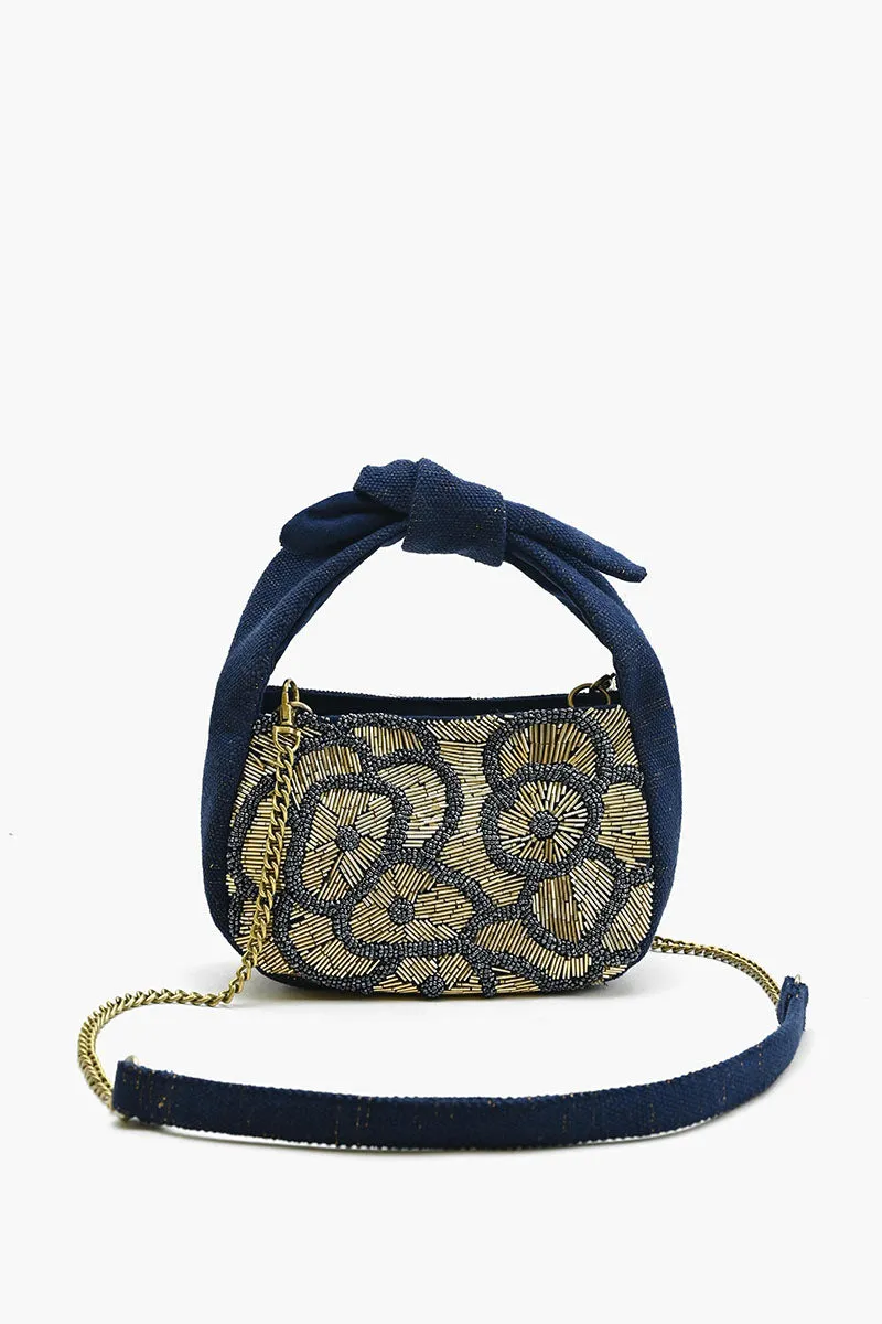 Royal Flower Knot Bag sold by America & Beyond