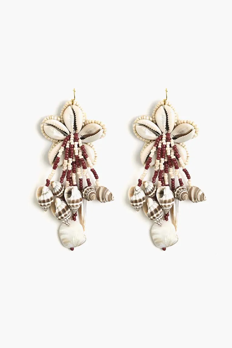 Sand & Sea Shells sold by America & Beyond