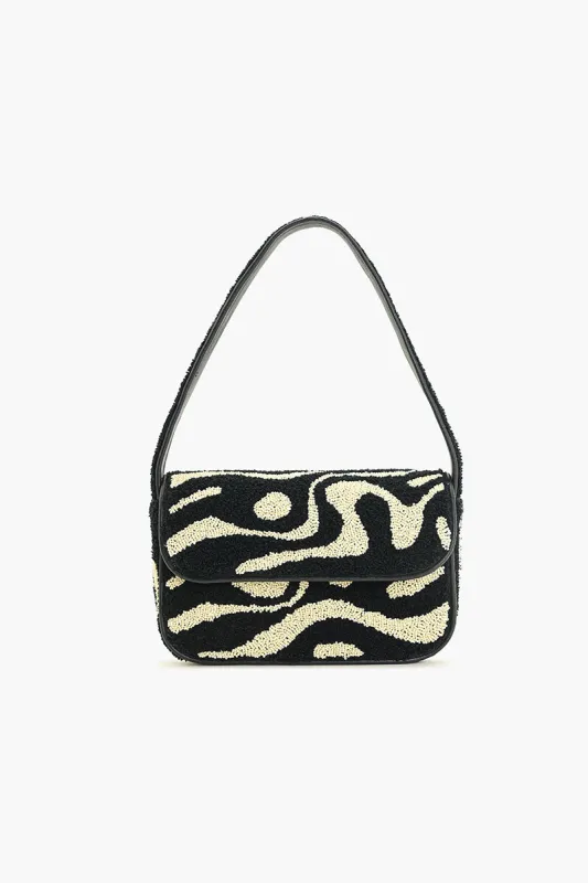 The Soho Inked Tufted Shoulder Bag sold by America & Beyond