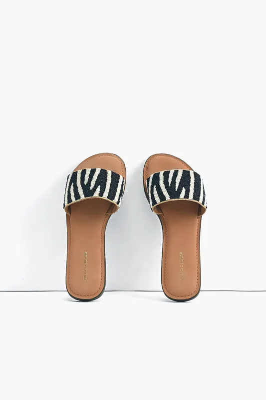 Zebra Slip on Sandals sold by America & Beyond