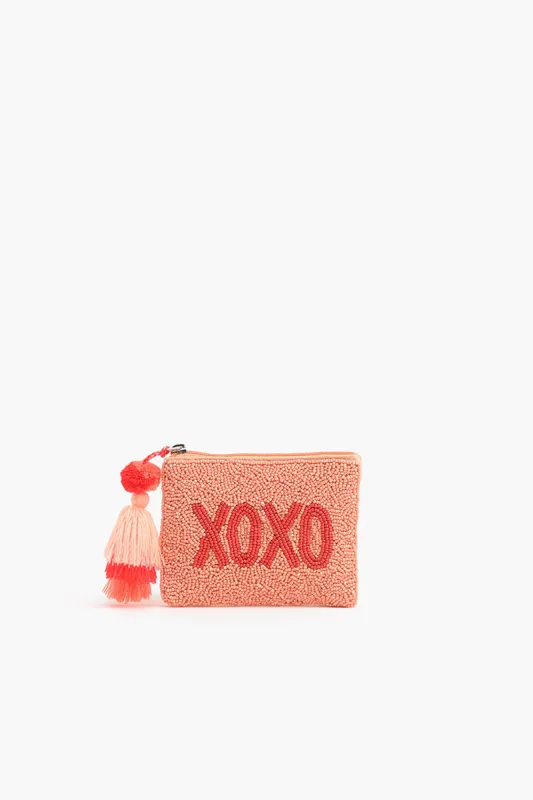 Peach XOXO Mini Pouches sold by America & Beyond