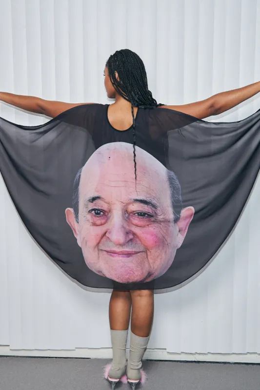 Marcus Pork Cape Dress sold by Fashion Brand Company