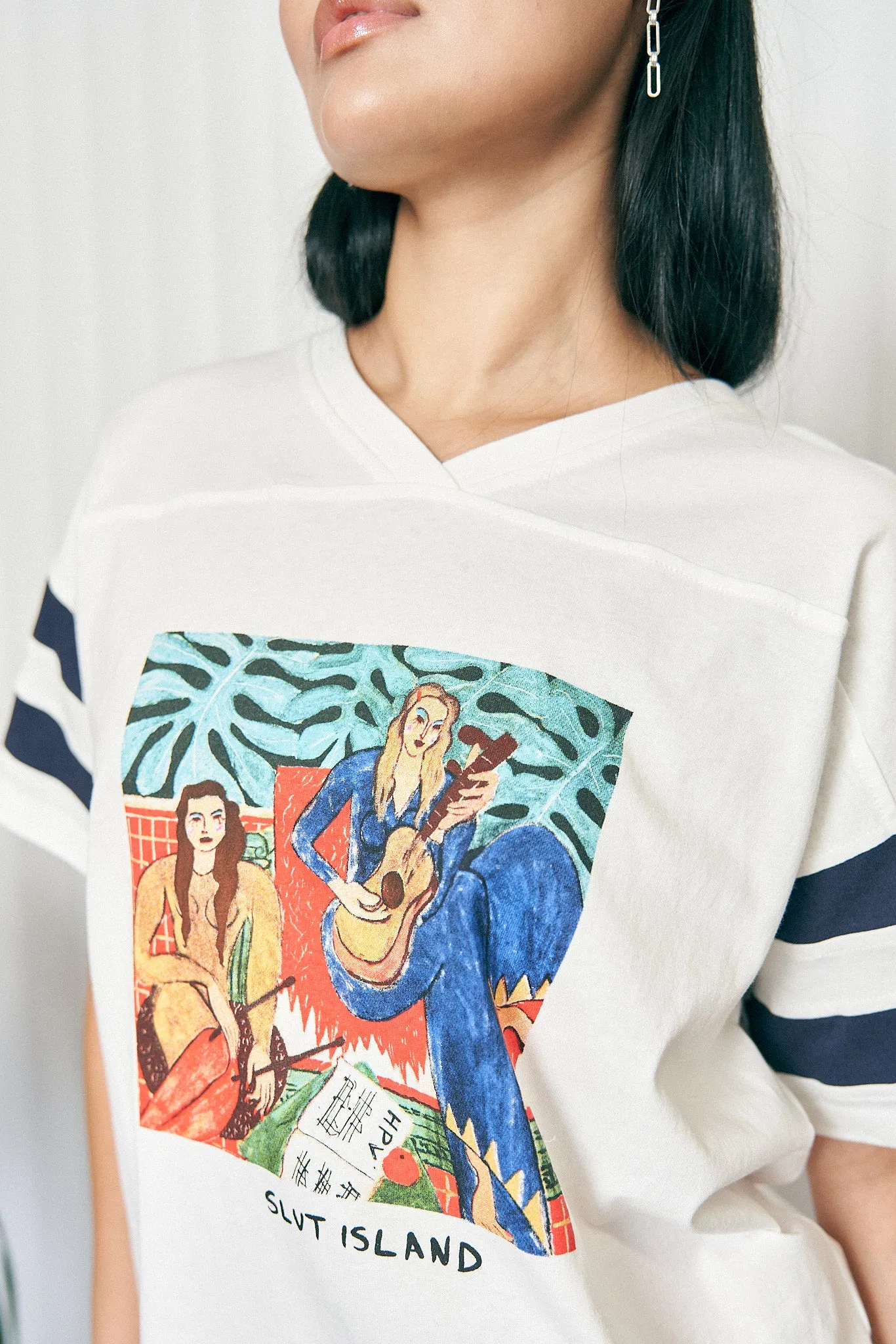 Unisex Slut Island Football T-Shirt sold by Fashion Brand Company product image thumbnail 2